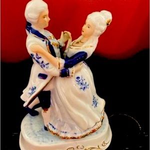 Blue and white ceramic dancing couple excellent condition.